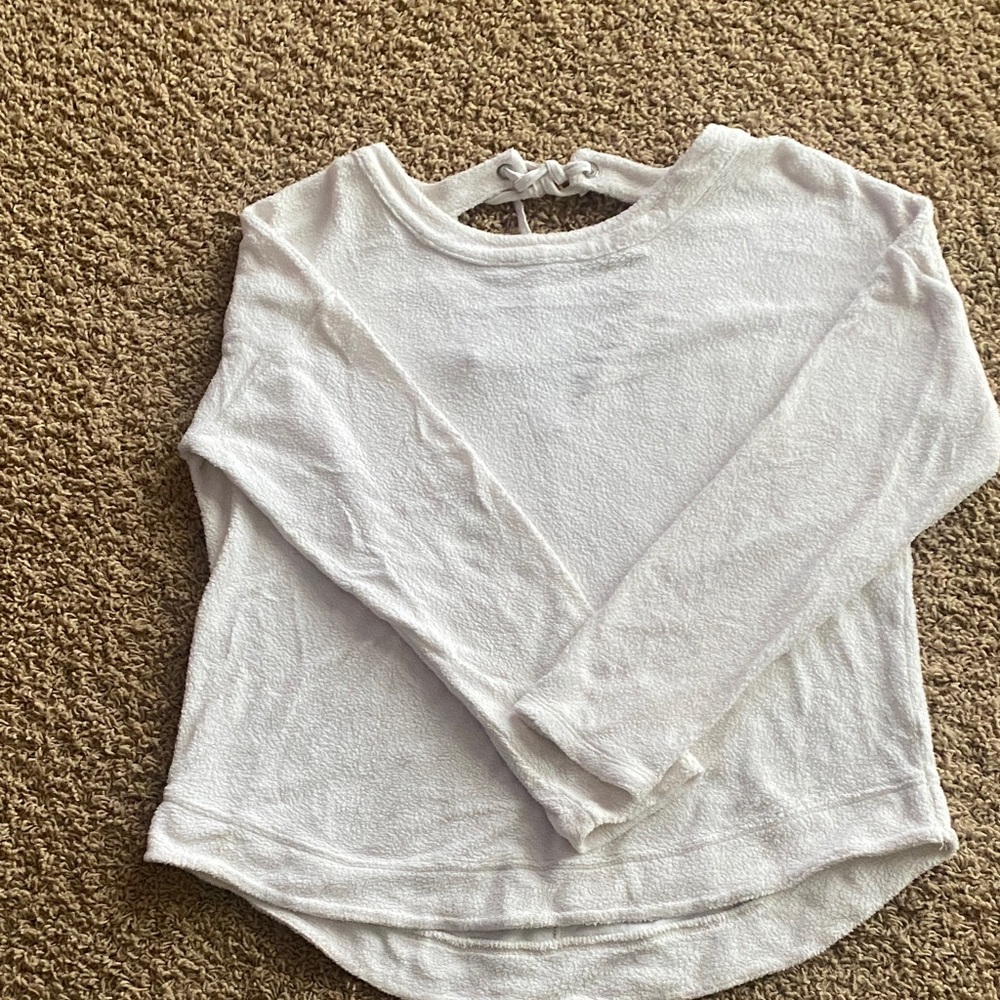 White Long Sleeve Sweater with open back.